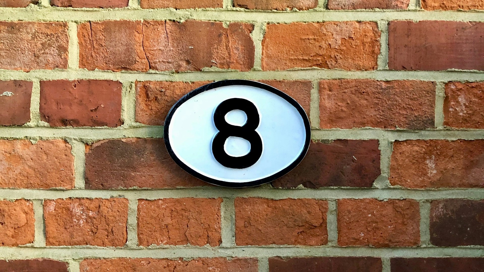 white and black 8 sign