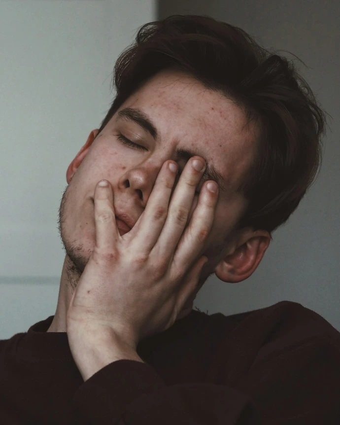man wearing black crew-neck top